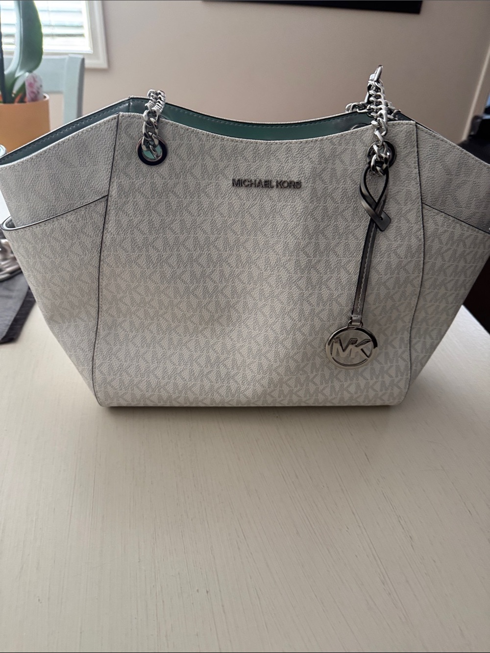 Michael Kors NWOT Purse in White-never used. No callouts.